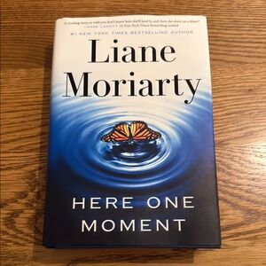 Book- Here One Moment by Liane Moriarty